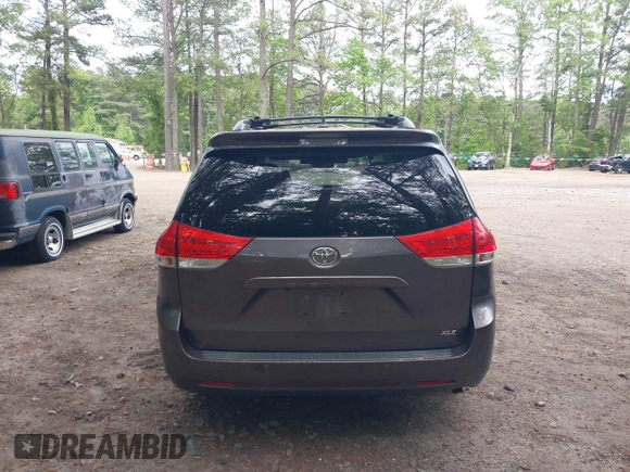 2011 Toyota Sienna XLE AAS with VIN 5TDYK3DC8BS016319, listed as a IAAI auction lot 42186294 with 293,401 mi miles and . Bid and sale history available at DreamBid. Image 16.