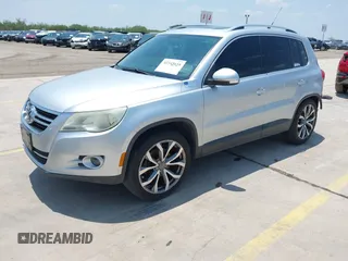 2010 Volkswagen Tiguan S with VIN WVGAV7AX6AW510843, listed as a IAAI auction lot 42345658 with 126,313 mi miles and . Bid and sale history available at DreamBid. Image 2.
