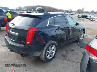2013 Cadillac SRX Luxury Collection z VIN 3GYFNCE35DS607553, wystawiony jako IAAI lot #42151522 z przebiegiem 104 688 mil mil oraz . Historia ofert i sprzedaży dostępna na DreamBid. Obrazek 4.