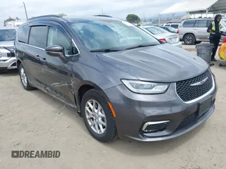 2022 Chrysler Pacifica Touring L z VIN 2C4RC1BG0NR134194, wystawiony jako IAAI lot #42082795 z przebiegiem 98 845 mil mil oraz . Historia ofert i sprzedaży dostępna na DreamBid. Obrazek 1.
