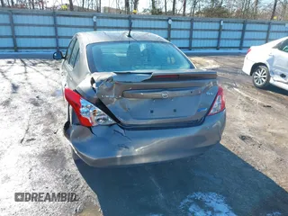 2014 Nissan Versa SV with VIN 3N1CN7AP9EL819833, listed as a IAAI auction lot 41351616 with 109,956 mi miles. Bid and sale history available at carsss.com. Image 6.