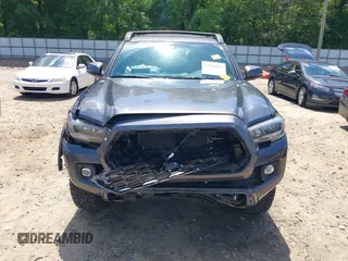 2023 Toyota Tacoma SR with VIN 3TMCZ5AN9PM553246, listed as a IAAI auction lot 42201812 with 20,907 mi miles and . Bid and sale history available at DreamBid. Image 13.