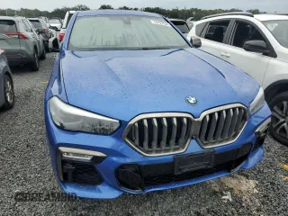 2020 BMW X6 M50i with VIN 5UXCY8C02L9B20285, listed as a Copart auction lot 74127524 with 0 mi miles and Non Repairable. Bid and sale history available at carsss.com. Image 5.