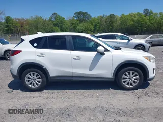 2013 Mazda CX-5 Touring with VIN JM3KE4CE8D0156843, listed as a IAAI auction lot 42018321 with 143,396 mi miles. Bid and sale history available at carsss.com. Image 13.