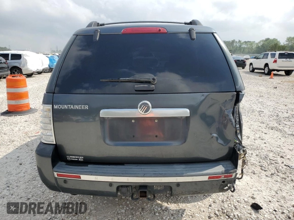 2010 Mercury Mountaineer z VIN 4M2EN3HE2AUJ07385, wystawiony jako Copart lot #51235735 z przebiegiem 174 742 mil mil oraz Szkoda całkowita • Salvage title. Historia ofert i sprzedaży dostępna na DreamBid. Obrazek 6.