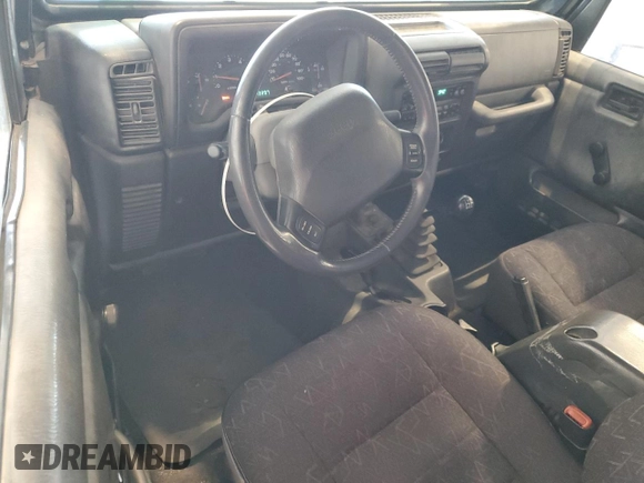 2002 Jeep Wrangler Sport with VIN 1J4FA49S82P713459, listed as a Copart auction lot 52745955 with 173,297 mi miles and Salvage Title. Bid and sale history available at carsss.com. Image 8.