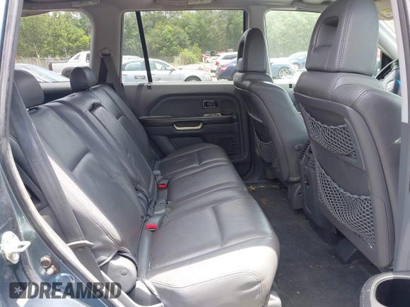 2005 Honda Pilot EX-L with VIN 5FNYF18595B050248, listed as a IAAI auction lot 42474308 with 311,580 mi miles and . Bid and sale history available at DreamBid. Image 8.