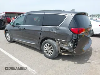 2017 Chrysler Pacifica Touring L with VIN 2C4RC1BG1HR540246, listed as a IAAI auction lot 42107768 with 151,268 mi miles and . Bid and sale history available at DreamBid. Image 3.