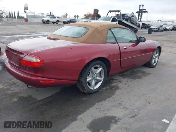 1997 Jaguar XK with VIN SAJGX2745VC017589, listed as a IAAI auction lot 42208129 with Not Provided miles and . Bid and sale history available at DreamBid. Image 4.