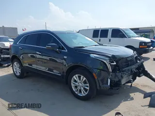 2023 Cadillac XT5 FWD Luxury with VIN 1GYKNAR40PZ193854, listed as a IAAI auction lot 42422246 with 26,053 mi miles and . Bid and sale history available at DreamBid. Image 1.