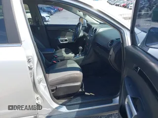 2014 Chevrolet Captiva Sport LS z VIN 3GNAL2EK9ES542755, wystawiony jako IAAI lot #41927805 z przebiegiem 126 551 mil mil oraz . Historia ofert i sprzedaży dostępna na DreamBid. Obrazek 5.