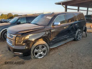 2016 Chevrolet Tahoe LTZ z VIN 1GNSCCKC9GR277560, wystawiony jako Copart lot #74314284 z przebiegiem 157 016 mil mil oraz Szkoda całkowita • Salvage title. Historia ofert i sprzedaży dostępna na DreamBid. Obrazek 1.