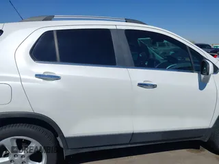 2015 Chevrolet Trax LTZ with VIN KL7CJTSBXFB236823, listed as a IAAI auction lot 42045817 with 138,930 mi miles. Bid and sale history available at carsss.com. Image 14.