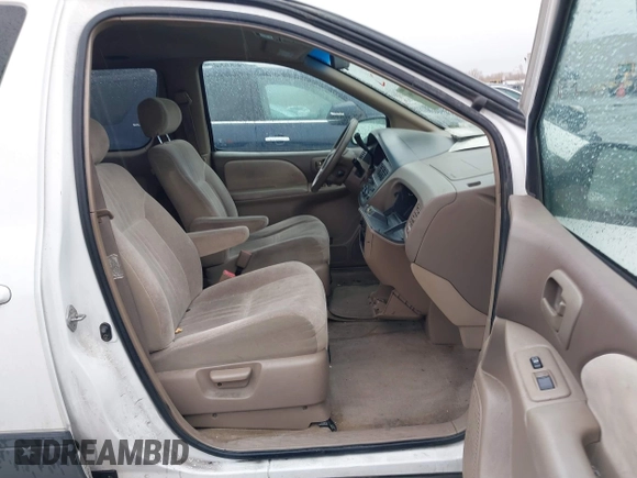 1999 Toyota Sienna CE with VIN 4T3ZF19C0XU169353, listed as a IAAI auction lot 41534196 with 189,783 mi miles. Bid and sale history available at carsss.com. Image 5.