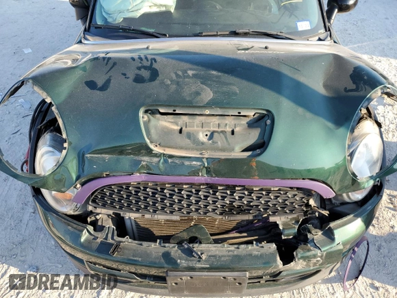 2014 MINI Clubman S z VIN WMWZG3C55ET800310, wystawiony jako Copart lot #74800274 z przebiegiem 97 378 mil mil oraz Szkoda całkowita • Salvage title. Historia ofert i sprzedaży dostępna na DreamBid. Obrazek 13.