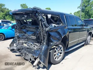 2015 GMC Yukon XL Denali with VIN 1GKS2JKJ9FR244754, listed as a IAAI auction lot 39706952 with 94,917 mi miles. Bid and sale history available at carsss.com. Image 18.