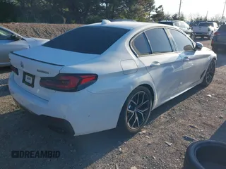 2023 BMW 5 Series M550i xDrive with VIN WBA13BK04PCL88909, listed as a IAAI auction lot 42045994 with 27,729 mi miles and . Bid and sale history available at DreamBid. Image 4.