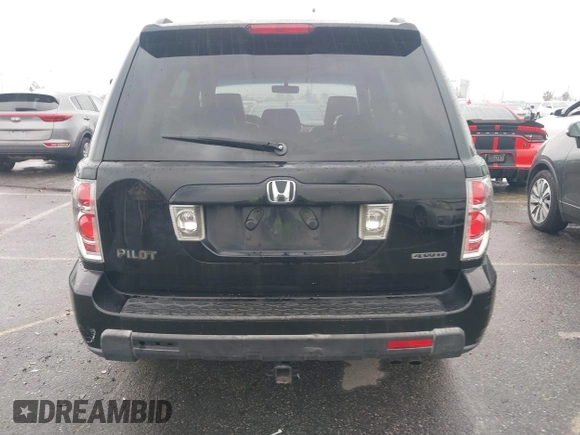 2007 Honda Pilot EX-L with VIN 2HKYF18557H500711, listed as a IAAI auction lot 41794731 with 168,553 mi miles. Bid and sale history available at carsss.com. Image 16.