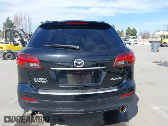 2015 Mazda CX-9 Grand Touring z VIN JM3TB2DA4F0450014, wystawiony jako IAAI lot #41692935 z przebiegiem 90 800 mil mil oraz . Historia ofert i sprzedaży dostępna na DreamBid. Obrazek 16.