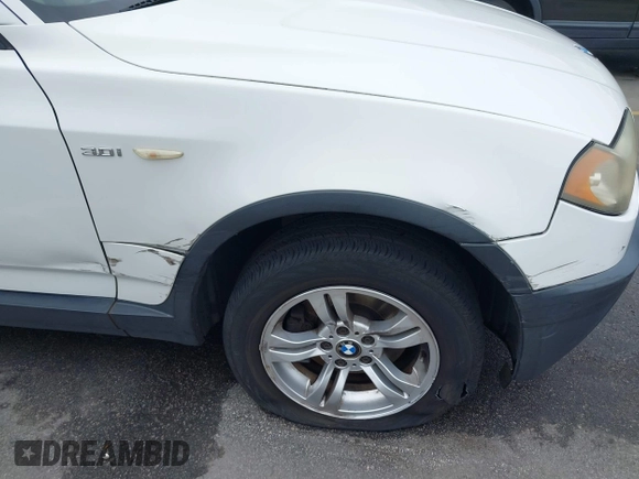 2004 BMW X3 3.0i with VIN WBXPA93484WC30585, listed as a IAAI auction lot 41034823 with 114,676 mi miles. Bid and sale history available at carsss.com. Image 6.