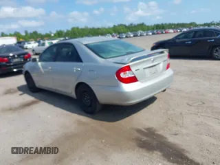 2003 Toyota Camry LE with VIN 4T1BE32K63U752904, listed as a IAAI auction lot 42142677 with 112,895 mi miles and . Bid and sale history available at DreamBid. Image 3.