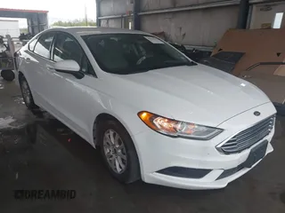 2018 Ford Fusion S z VIN 3FA6P0G77JR186152, wystawiony jako IAAI lot #41829063 z przebiegiem 71 782 mil mil oraz . Historia ofert i sprzedaży dostępna na DreamBid. Obrazek 1.