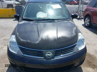 2008 Nissan Versa 1.8 S with VIN 3N1BC13E28L452563, listed as a IAAI auction lot 42118357 with 164,290 mi miles. Bid and sale history available at carsss.com. Image 6.