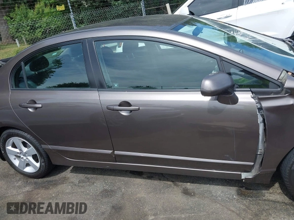 2010 Honda Civic LX-S z VIN 2HGFA1F60AH544781, wystawiony jako IAAI lot #42303801 z przebiegiem 168 544 mil mil oraz . Historia ofert i sprzedaży dostępna na DreamBid. Obrazek 14.
