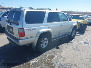 2000 Toyota 4Runner Limited with VIN JT3GN87R6Y0157146, listed as a IAAI auction lot 41696224 with 254,996 mi miles. Bid and sale history available at carsss.com. Image 4.