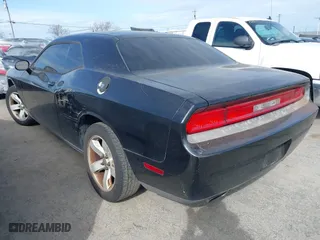 2011 Dodge Challenger with VIN 2B3CJ4DG9BH543159, listed as a IAAI auction lot 41850958 with 209,422 mi miles. Bid and sale history available at carsss.com. Image 3.