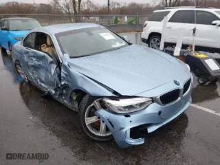 2015 BMW 4 Series 428i xDrive with VIN WBA3T1C58FP820664, listed as a IAAI auction lot 41846954 with 78,013 mi miles. Bid and sale history available at carsss.com. Image 1.