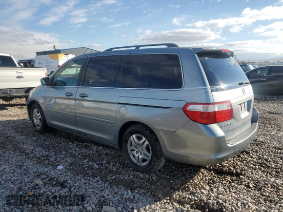 2007 Honda Odyssey EX-L with VIN 5FNRL38647B023186, listed as a Copart auction lot 87697035 with 190,884 mi miles and Salvage Title. Bid and sale history available at carsss.com. Image 2.