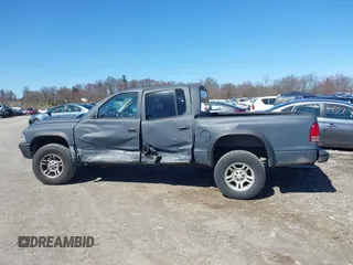 2004 Dodge Dakota Sport with VIN 1D7HG38K84S608161, listed as a IAAI auction lot 41863394 with 145,288 mi miles and . Bid and sale history available at DreamBid. Image 14.