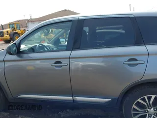 2016 Mitsubishi Outlander SE z VIN JA4AZ3A3XGZ049548, wystawiony jako IAAI lot #42393429 z przebiegiem 74 218 mil mil oraz . Historia ofert i sprzedaży dostępna na DreamBid. Obrazek 14.