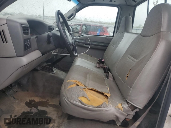 1999 Ford Super Duty F-250 XL with VIN 1FTNF20L0XEA51389, listed as a Copart auction lot 52618635 with 198,767 mi miles and Salvage Title. Bid and sale history available at carsss.com. Image 7.