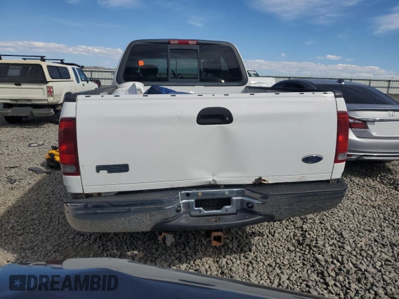 2003 Ford F-150 XL with VIN 1FTRX18L03NA96484, listed as a Copart auction lot 50834755 with 242,836 mi miles and Salvage title. Bid and sale history available at DreamBid. Image 6.