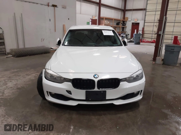 2014 BMW 3 Series 328i with VIN WBA3C1C52EK112194, listed as a IAAI auction lot 41694770 with 139,609 mi miles. Bid and sale history available at carsss.com. Image 12.