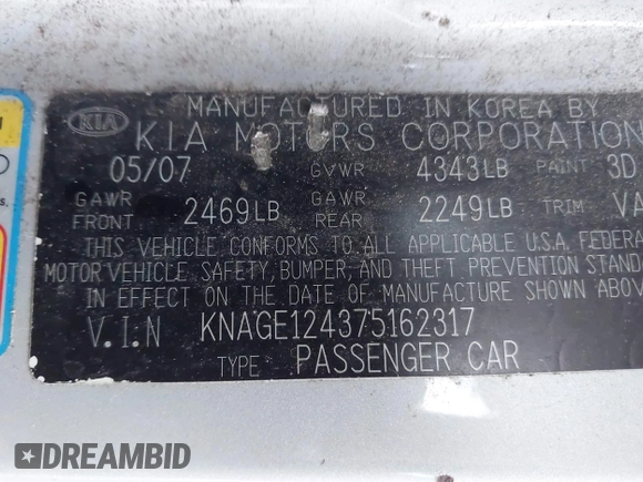 2007 Kia Optima EX with VIN KNAGE124375162317, listed as a IAAI auction lot 41246445 with 174,128 mi miles. Bid and sale history available at carsss.com. Image 9.