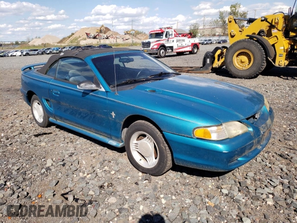 1994 Ford Mustang with VIN 1FALP4442RF186105, listed as a Copart auction lot 74677924 with 185,072 mi miles and Clean title. Bid and sale history available at DreamBid. Image 4.