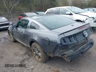 2013 Ford Mustang V6 with VIN 1ZVBP8AMXD5260397, listed as a IAAI auction lot 41729133 with 138,797 mi miles. Bid and sale history available at carsss.com. Image 3.