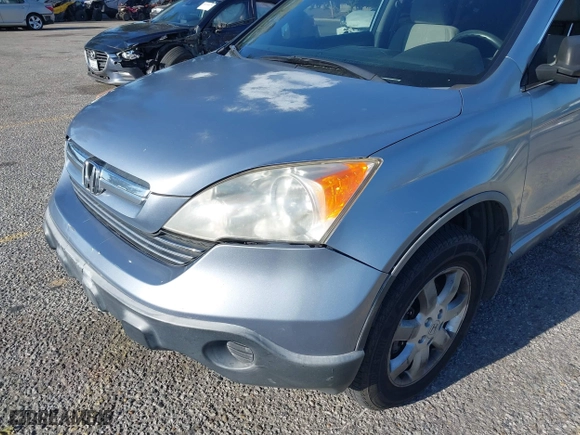 2007 Honda CR-V EX with VIN JHLRE38567C044218, listed as a IAAI auction lot 41960696 with 188,548 mi miles. Bid and sale history available at carsss.com. Image 17.