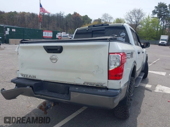 2017 Nissan Titan SV with VIN 1N6AA1E50HN540827, listed as a IAAI auction lot 42105294 with 139,914 mi miles and . Bid and sale history available at DreamBid. Image 4.