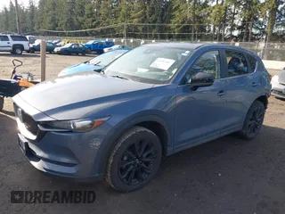 2021 Mazda CX-5 Touring with VIN JM3KFACM6M0483194, listed as a IAAI auction lot 41503907 with 41,237 mi miles. Bid and sale history available at carsss.com. Image 19.