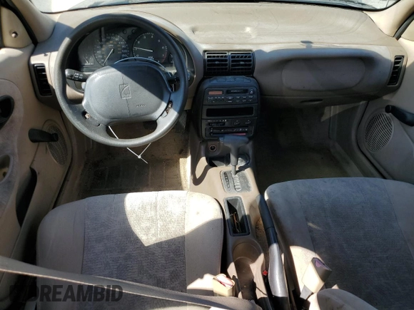 1999 Saturn SL с VIN 1G8ZK527XXZ111390, выставлен на аукционе Copart как лот 49042185 с пробегом 164 733 миль миль и Списание • Salvage title. История ставок и продаж доступна на DreamBid. Изображение 8.