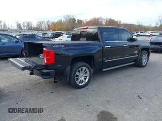 2016 Chevrolet Silverado 1500 High Country with VIN 3GCUKTEC2GG344953, listed as a IAAI auction lot 40700121 with 107,623 mi miles and . Bid and sale history available at DreamBid. Image 4.