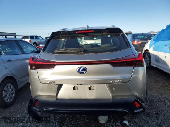 2021 Lexus UX with VIN JTHE9JBH3M2050145, listed as a Copart auction lot 86389664 with 24,937 mi miles and Salvage Title. Bid and sale history available at carsss.com. Image 6.