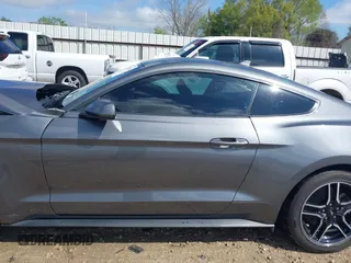 2023 Ford Mustang EcoBoost with VIN 1FA6P8TH6P5105487, listed as a IAAI auction lot 41877024 with 24,066 mi miles. Bid and sale history available at carsss.com. Image 15.
