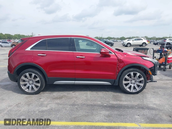 2021 Cadillac XT4 FWD Premium Luxury with VIN 1GYFZCR41MF043072, listed as a IAAI auction lot 41769251 with 31,053 mi miles. Bid and sale history available at carsss.com. Image 13.