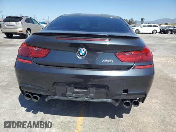 2015 BMW M6 z VIN WBSLX9C58FD160609, wystawiony jako Copart lot #56992535 z przebiegiem 52 324 mil mil oraz Tytuł czysty. Historia ofert i sprzedaży dostępna na DreamBid. Obrazek 6.