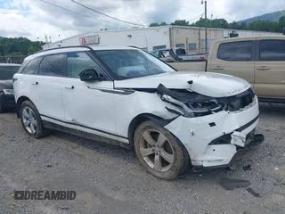 2020 Land Rover Range Rover Velar S z VIN SALYB2EX2LA256971, wystawiony jako IAAI lot #42525724 z przebiegiem 76 802 mil mil oraz . Historia ofert i sprzedaży dostępna na DreamBid. Obrazek 1.